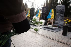 Laying flowers at the graves of the dead
