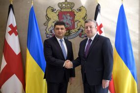 Vladimir Groisman and Giorgi Kvirikashvili