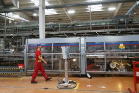Worker in one of the shops at the Coca-Cola plant