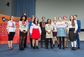 Peace Corps volunteers sing the anthem