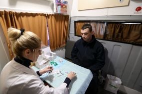 A policeman is tested for HIV infection