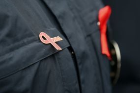 Red Ribbon icon on police uniform