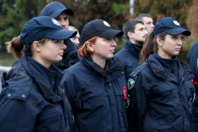 Policemen with a red ribbon on a uniform