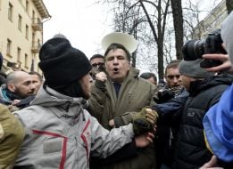 Mikheil Saakashvili is surrounded by his supporters