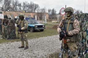 Servicemen on the roadblock