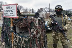 Servicemen on the roadblock