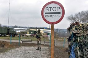 Servicemen on the roadblock