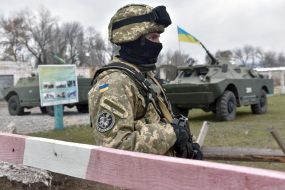 Servicemen on the roadblock