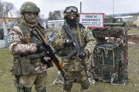 Servicemen on the roadblock