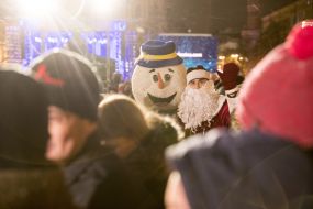 Animators in the costumes of a snowman and Santa Claus