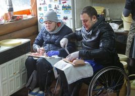 Men chop the sausage