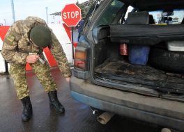 Border guards check the car