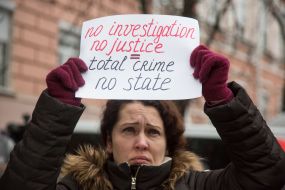 Girl holding a flyer
