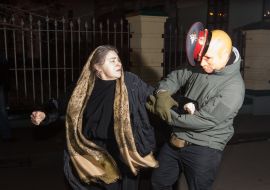 A woman and an activist of the organization "C14"