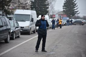 Cars in line to the checkpoint Chegini