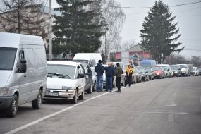 Cars in line to the checkpoint Chegini