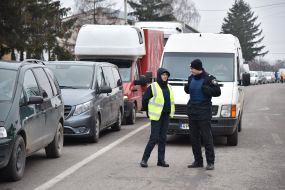 Cars in line to the checkpoint Chegini