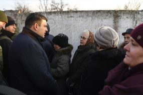 Vladimir Groisman communicates with people