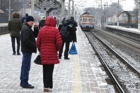 People stand on a platform