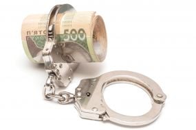 Money and handcuffs