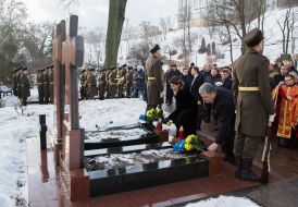 Laying flowers at the Cross Cross Heroes Krut