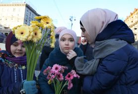 Participants of the action dedicated to the Day of Hijab