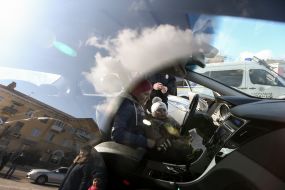 Woman with child in car patrol police