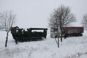 BAT-2 trailer pulls a truck from the cuvette