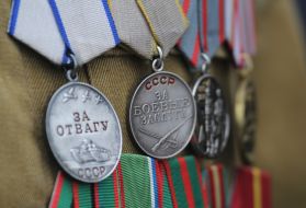 Медалі на формі ветерана афганської війни