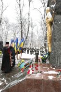 The priests conduct a memorial service for the soldiers who died in Afghanistan