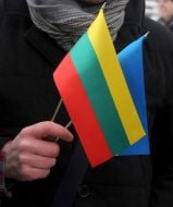 People hold the flag of Lithuania and Ukraine