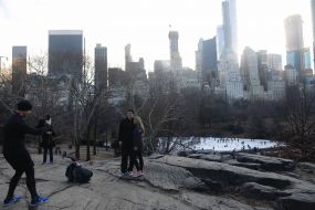 The guy takes a picture of a couple