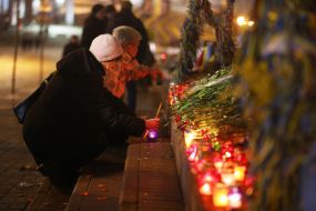 People lit candles on the Heroes of Heavenly Hundred alleys