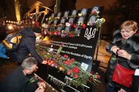 People lit candles on the Heroes of Heavenly Hundred alleys