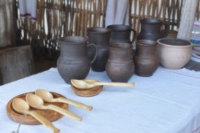 Wooden spoons and earthenware jugs