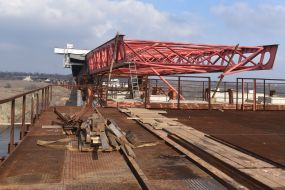 The final stage of sliding the bridge's metal structure across the Dnepr