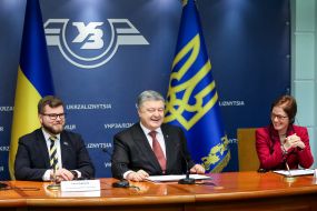 Евгений Кравцов, Петр Порошенко и Мари Йованович