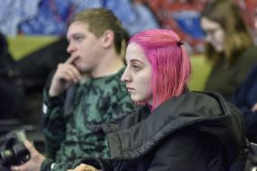 Young people in the hall of the press center