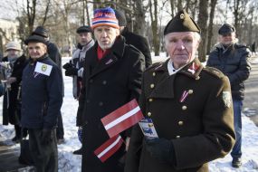 Participants in the ceremony of laying flowers