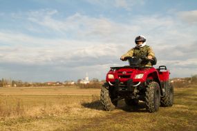 Border guards on a quad bike