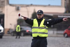A police officer regulates traffic