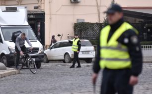 A police officer regulates traffic