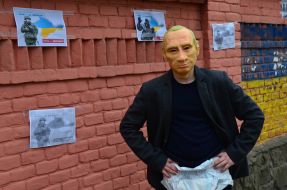Participant of the action in Putin's mask
