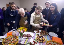 Children with Down syndrome treat visitors