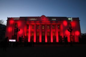 The building of Verkhovna Rada in red illumination