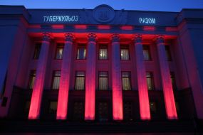 The building of Verkhovna Rada in red illumination