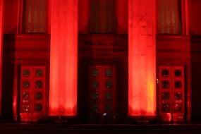 The building of Verkhovna Rada in red illumination