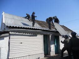 Rescuers recover damaged residential buildings