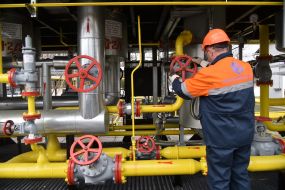 Worker near gas pipes