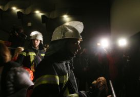Rescuers of the State Emergency Service in the hall of the cinema
